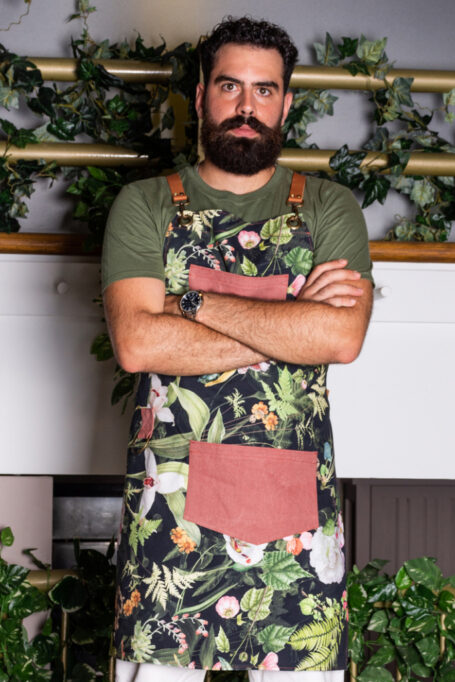 Beautiful tropical patterned durable cotton apron with leather straps and customizable logo options for professionals and unique gifts.