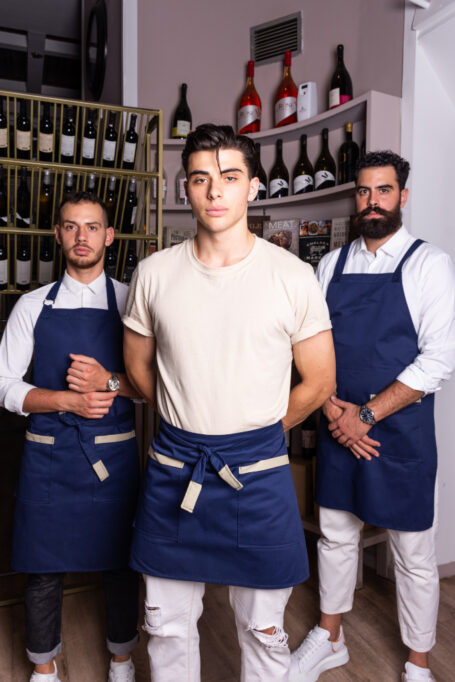 Discover our dark blue polycotton aprons, stylish and functional for professionals. Choose from Waist, Neck strap, or Cross-back styles for a customizable fit. Elevate your workwear with these modern, comfortable aprons, perfect for a range of activities in the kitchen and garden. Ideal for baristas, chefs, and creative makers.