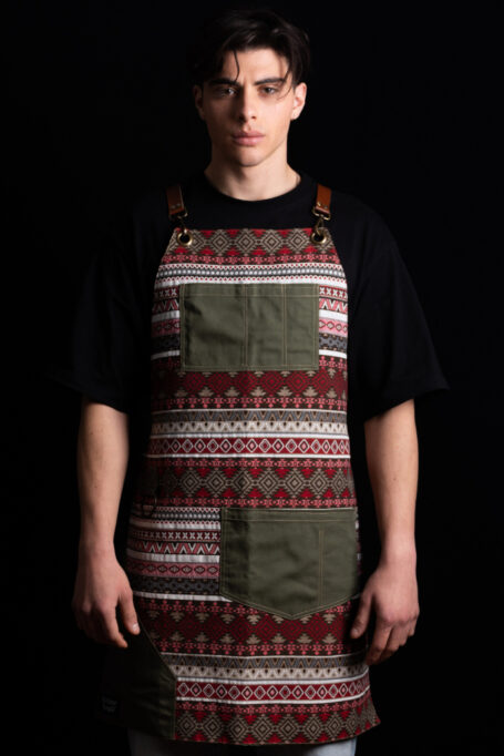 Boho Apron - Beautiful and durable patterned fabric with olive green accents, perfect for professionals. Cross-back straps, convenient pockets, and customizable with your logo. Ideal for chefs, baristas, and more. Perfect gift option. Shop now!