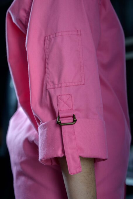 Pink personalized shirt with two small pockets on both sleeves for useful tools.