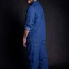 Stylish workwear that can be worn as street wear clothes as well. Barista wearing his custom shirt with matching blue denim pants.