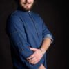 Modern and stylish workwear designed with attention to details. Man wearing custom shirt, made from durable blue denim fabric.