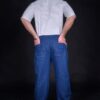 Custom blue denim work pants with two back pockets. Unisex street style pants made from medium weight breathable fabric.