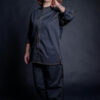 Personalized shirt with matching medium weight fabric black pants, made from medium weight fabric. Woman wearing stylish workwear clothes.