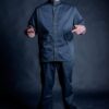 Stylish and comfortable barber apparel for men. Black barber coat with stylish mao collar and front pocket.