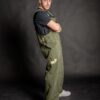 Stylish workwear from top to bottom, with cotton hammer loop on upper leg side. Man wearing loose fit overall pants, made from heavy weight durable cotton fabric.