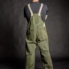 Wood worker wearing a fashionable unisex streetwear salopette with two back pockets and adjustable elastic ankle cuffs.