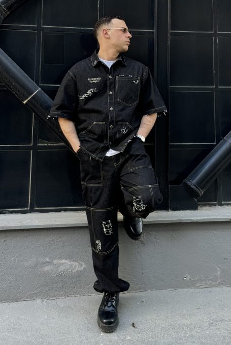 Distressed gray denim jacket with urban style for men.